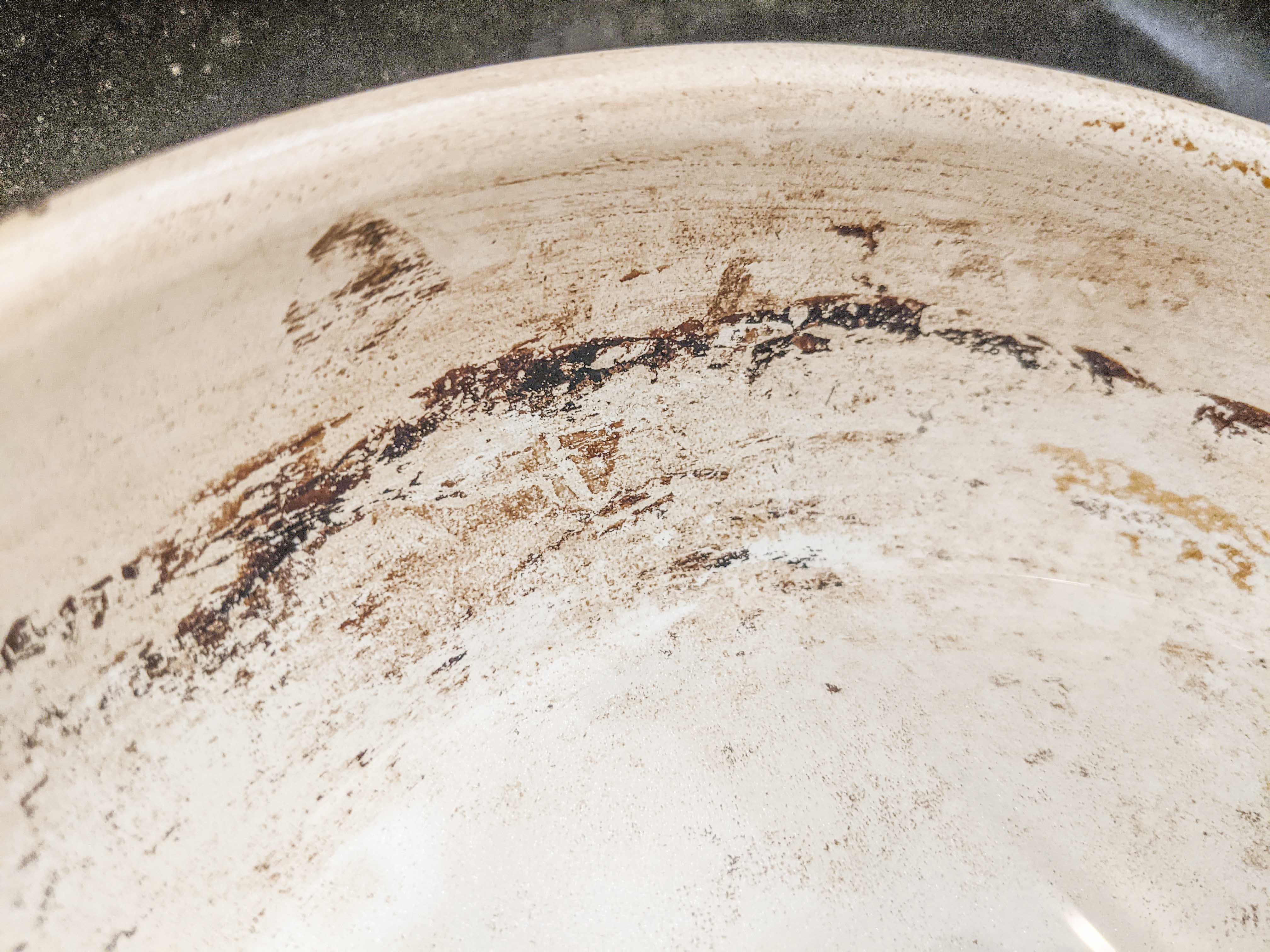Cleaning oil burn marks from Le Creuset pot